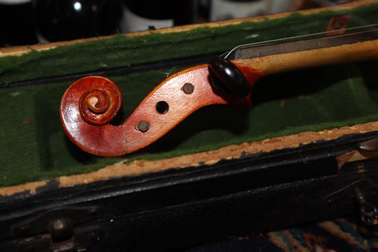 A German three-quarter size violin and bow, cased